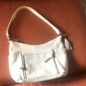 So many pockets! Leather shoulder purse. Off white with cute tassel by the sak.